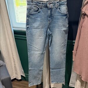 Women’s Skinny Jeans in Light Blue Wash with Rhinestones throughout the jeans.